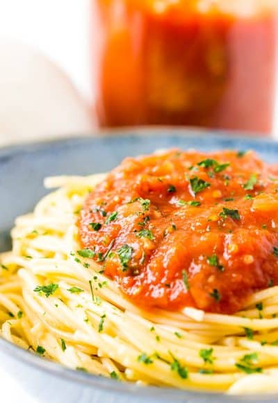 Pomodoro Sauce is a thick and flavorful Italian pasta sauce recipe made with tomatoes, onion, garlic, basil, and red pepper flakes. An easy and delicious homemade sauce the whole family will love!