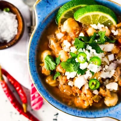 This Slow Cooker Posole (or Pozole) is a traditional Mexican stew made with hominy and pork and a flavorful broth that's super easy to make!