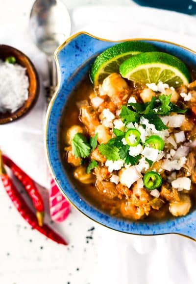 This Slow Cooker Posole (or Pozole) is a traditional Mexican stew made with hominy and pork and a flavorful broth that's super easy to make!