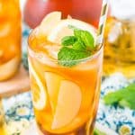 This Homemade Apple Iced Tea is made with freshly brewed black tea, sweet apple juice, fresh apple slices, and a squeeze of lemon for a refreshing summer drink that's easy to make. This flavored iced tea is naturally sweetened by the fruit juice and great for a party!