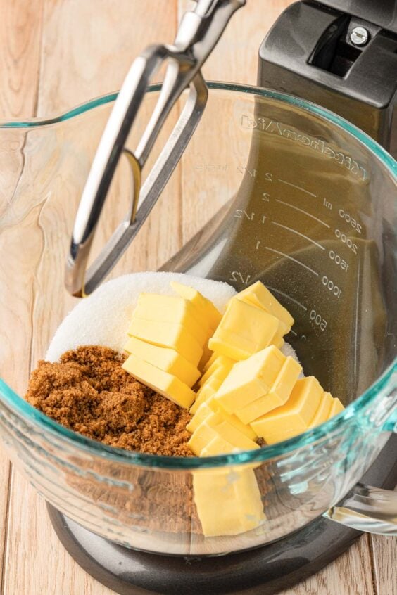 Butter and sugars ready to be creamed in a mixing bowl.