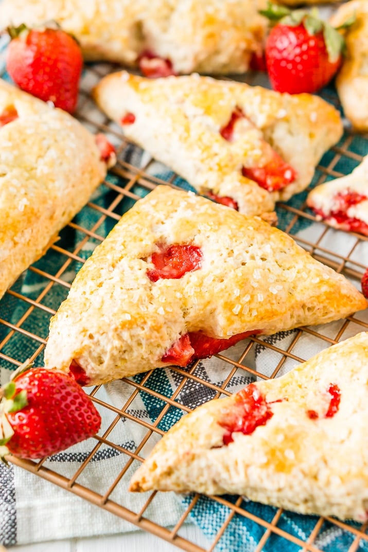 Strawberry scones cooling on a wire rack.