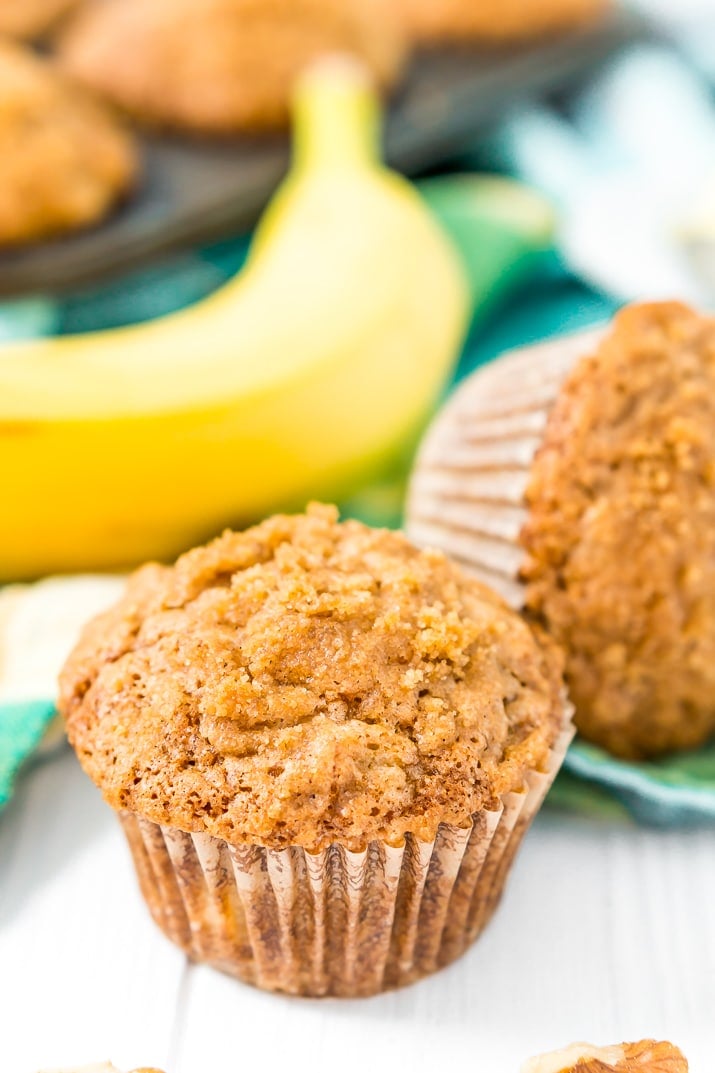 These Banana Muffins are loaded with crunchy walnuts and sweet cinnamon, then topped with a sugary crumble no one can resist!