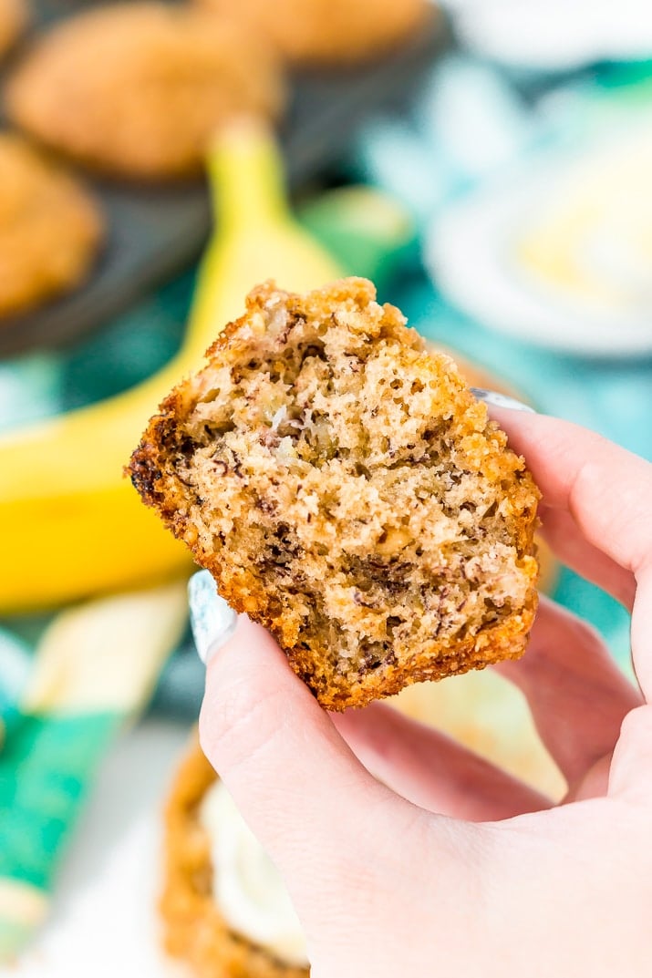 These Banana Muffins are loaded with crunchy walnuts and sweet cinnamon, then topped with a sugary crumble no one can resist!