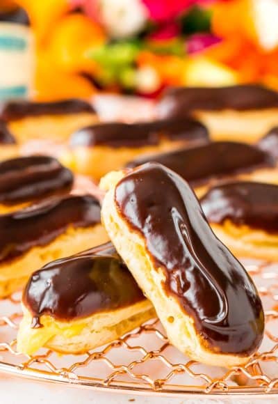 The Eclair is a classic French pastry traditionally made with choux dough, pastry cream filling, and dipped in a rich chocolate glaze. They're a fancy dessert that's easy to make at home!