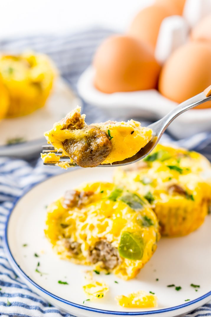 This Crustless Mini Quiche Recipe made with eggs, sausage, green peppers, and cheese are perfect for quick weekday breakfasts or weekend brunch! Make them ahead of time and freeze them for when you want them!