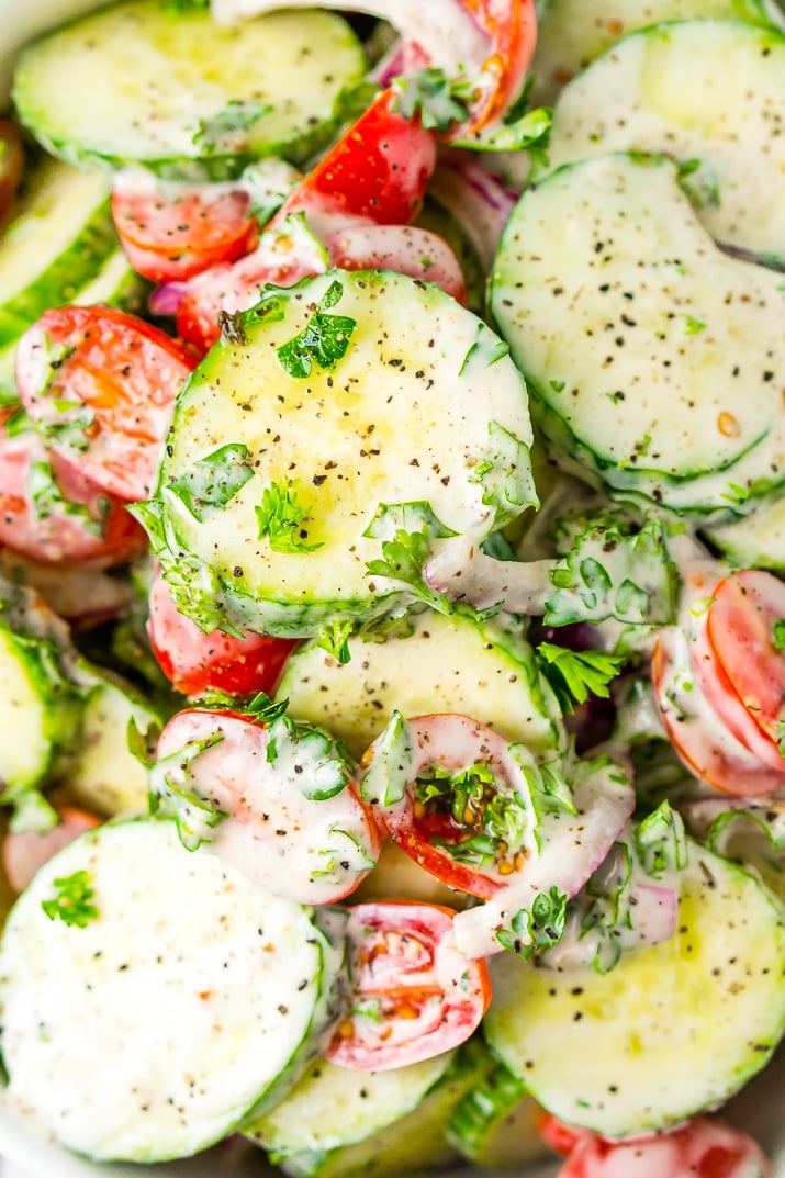 This Cucumber Tomato Salad is a simple and refreshing side dish that can be made with a creamy Italian dressing or a vinegar dressing.