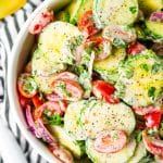 This Cucumber Tomato Salad is a simple and refreshing side dish that can be made with a creamy Italian dressing or a vinegar dressing.