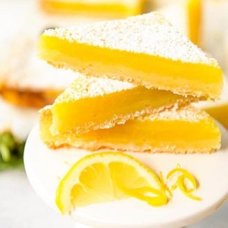 Tart lemon custard & subtly sweet shortbread make these bright and tasty Lemon Bars the perfect summer treat! These highly portable dessert bars can be cut to any size you need, and are great for all your picnics in the park, outdoor barbecues, and pool parties all season long.