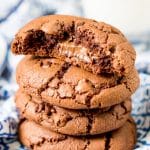 These Nutella Stuffed Cookies are a delicious double chocolate chip cookie that's laced with Nutella and stuffed with a gooey hazelnut chocolate filling.