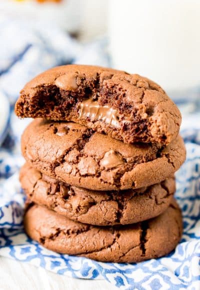 These Nutella Stuffed Cookies are a delicious double chocolate chip cookie that's laced with Nutella and stuffed with a gooey hazelnut chocolate filling.