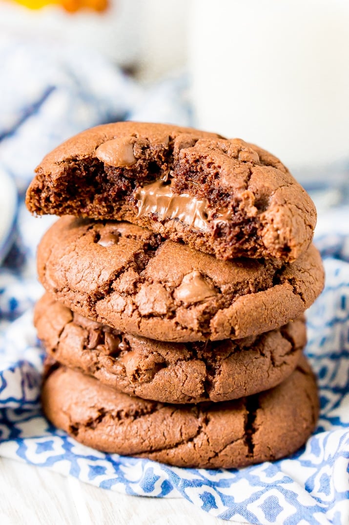 These Nutella Stuffed Cookies are a delicious double chocolate chip cookie that's laced with Nutella and stuffed with a gooey hazelnut chocolate filling.