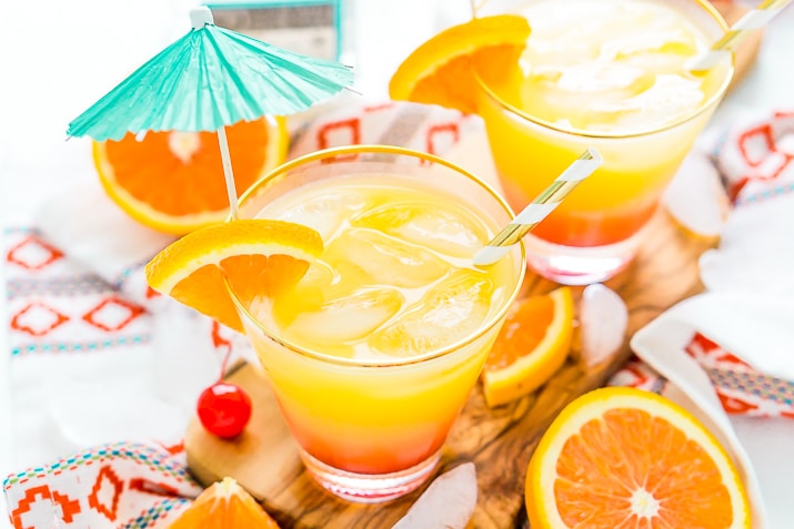 The Tequila Sunrise is an easy, classic cocktail made with zesty orange juice, refreshing tequila, and sweet grenadine. Perfect for hot summer nights and get-togethers!