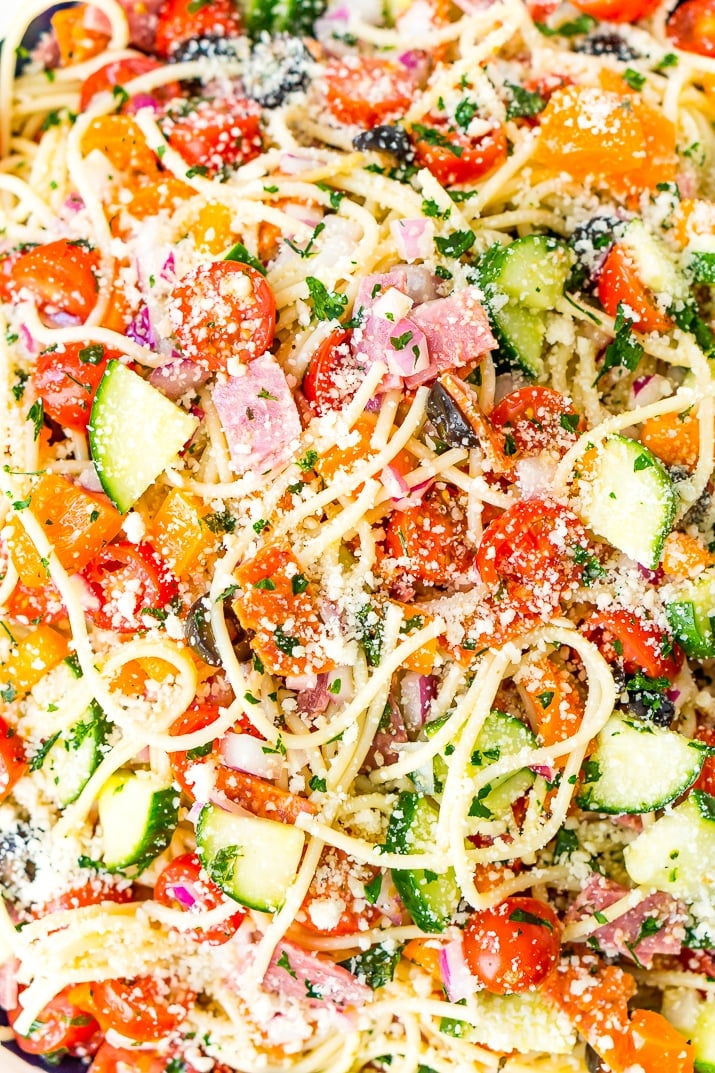 Spaghetti Salad is loaded with veggies, pepperoni, and salami, then tossed in an oil and vinegar dressing. Topped with a sprinkle of parsley and lots of Parmesan cheese, it’s a perfect summer meal or side dish!