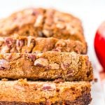 This simple Applesauce Bread is the perfect way to enjoy some of fall’s best flavors. Laced with warm spices, brown sugar, and chopped pecans, this quick bread is a delicious treat to make and share during the autumn season.