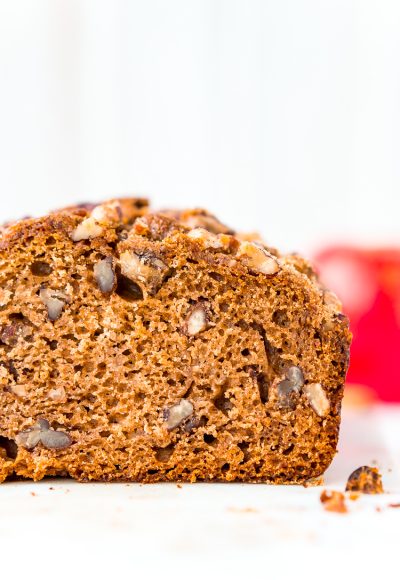 This simple Applesauce Bread is the perfect way to enjoy some of fall’s best flavors. Laced with warm spices, brown sugar, and chopped pecans, this quick bread is a delicious treat to make and share during the autumn season.