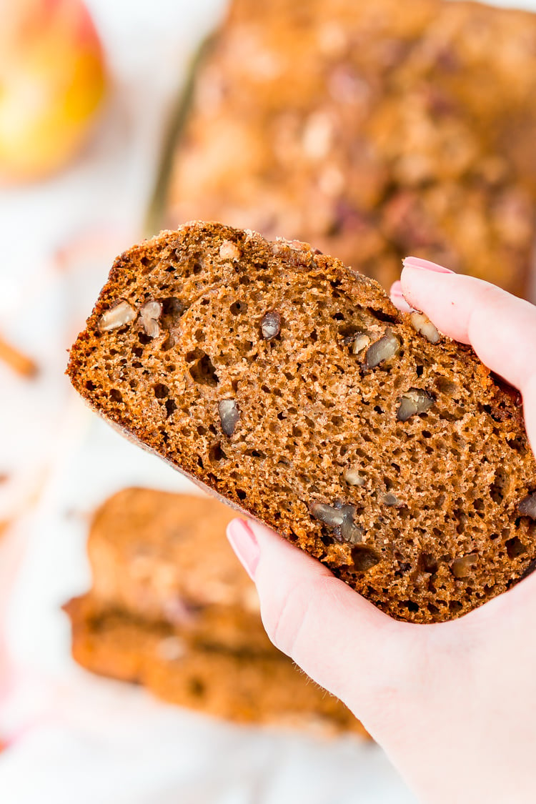This simple Applesauce Bread is the perfect way to enjoy some of fall’s best flavors. Laced with warm spices, brown sugar, and chopped pecans, this quick bread is a delicious treat to make and share during the autumn season.