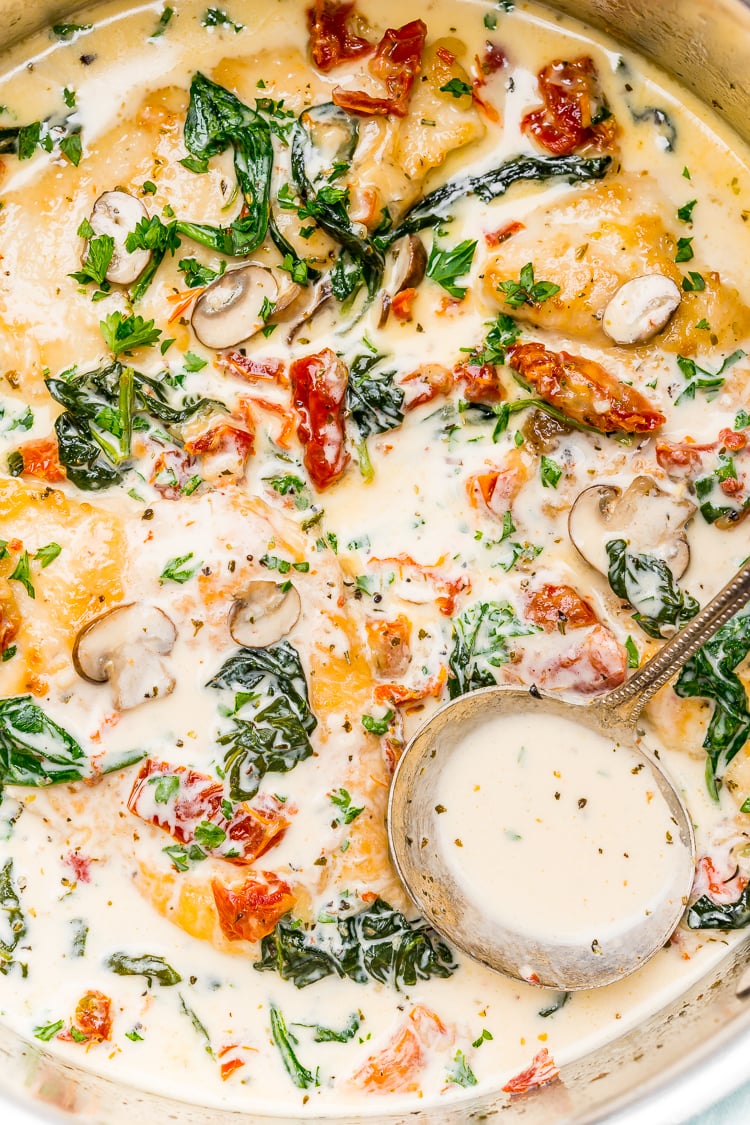 Creamy Tuscan Chicken is a gourmet homemade meal that takes just 30 minutes! Made with chicken, sundried tomatoes, spinach, mushrooms, spices, cheese, and heavy cream, this is a perfect family-friendly recipe to whip up on any night of the week.