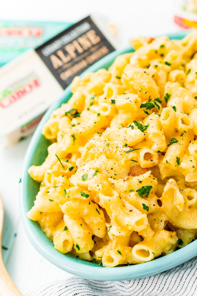 This Crock Pot Mac and Cheese is an easy and delicious dinner loaded with cheddar and Colby Jack cheeses and perfect for a weeknight meal or cozy weekend dinner!