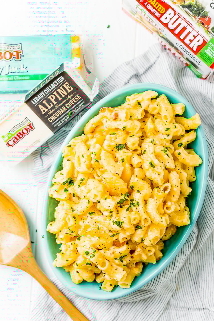 This Crock Pot Mac and Cheese is an easy and delicious dinner loaded with cheddar and Colby Jack cheeses and perfect for a weeknight meal or cozy weekend dinner!