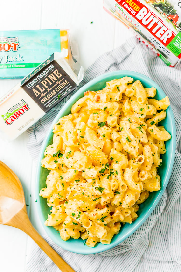 This Crock Pot Mac and Cheese is an easy and delicious dinner loaded with cheddar and Colby Jack cheeses and perfect for a weeknight meal or cozy weekend dinner!