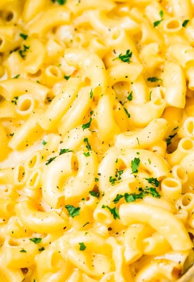 This Crock Pot Mac and Cheese is an easy and delicious dinner loaded with cheddar and Colby Jack cheeses and perfect for a weeknight meal or cozy weekend dinner!