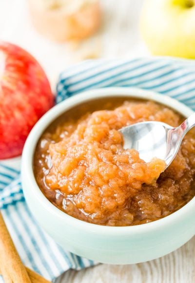 This Homemade Applesauce recipe is delicious and super easy to make! Made with apples, white and brown sugars, vanilla, cinnamon, and lemon juice, it’s the perfect way to enjoy fresh-picked apples.