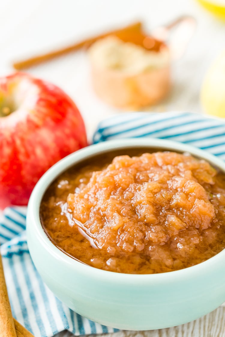 This Homemade Applesauce recipe is delicious and super easy to make! Made with apples, white and brown sugars, vanilla, cinnamon, and lemon juice, it’s the perfect way to enjoy fresh-picked apples.
