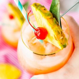 A Mai Tai is a boozy blend of coconut and spiced rum, triple sec, orange and pineapple juices, and a splash of grenadine. Mix up a batch for a taste of the tropics to enjoy with friends and family this summer.