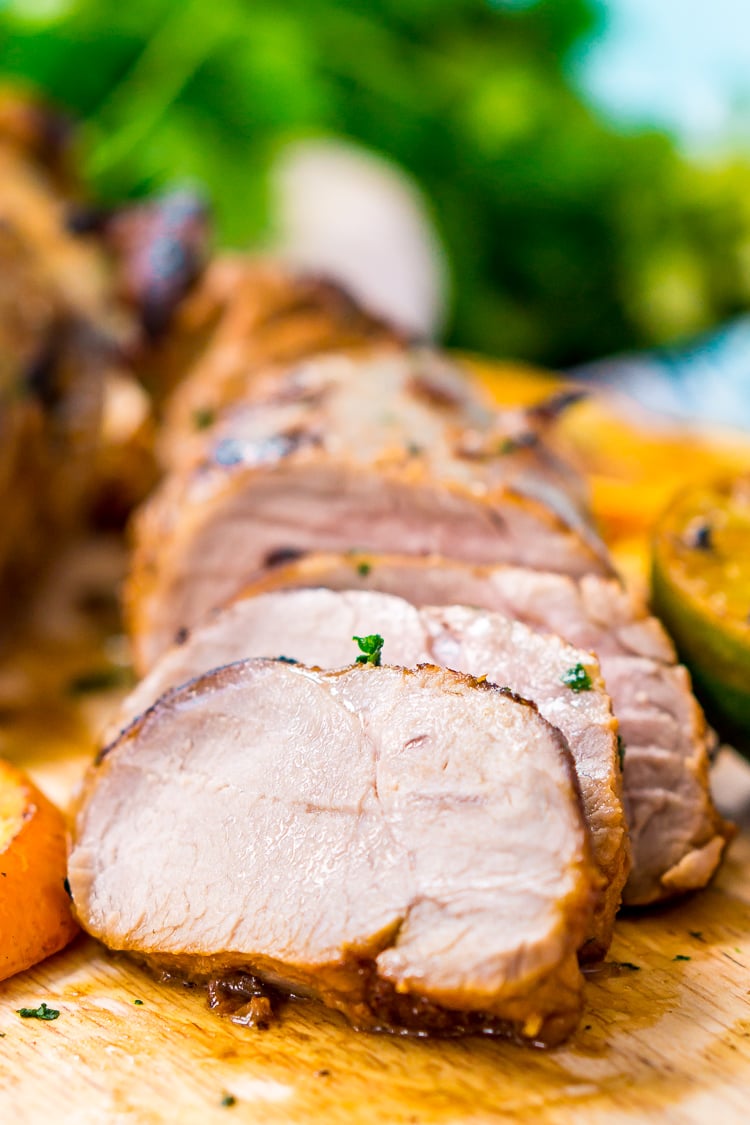 Cuban Mojo Pork is a delicious and easy pork tenderloin recipe made with freshly squeezed orange and lime juices, crushed garlic, minced cilantro, cumin, salt, and pepper.