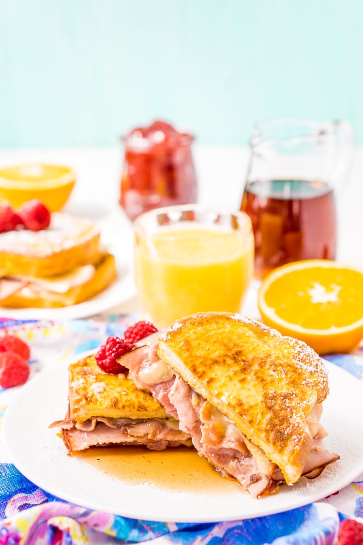 The Monte Cristo Sandwich is a breakfast twist on a classic ham and cheese. Tender slices of deli ham are sandwiched between two pieces of French toast and melty cheese for an addictive dish you'll want to make over and over again!