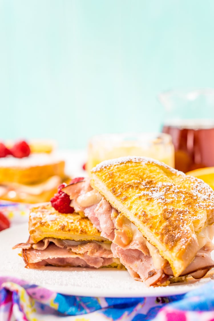 The Monte Cristo Sandwich is a breakfast twist on a classic ham and cheese. Tender slices of deli ham are sandwiched between two pieces of French toast and melty cheese for an addictive dish you'll want to make over and over again!