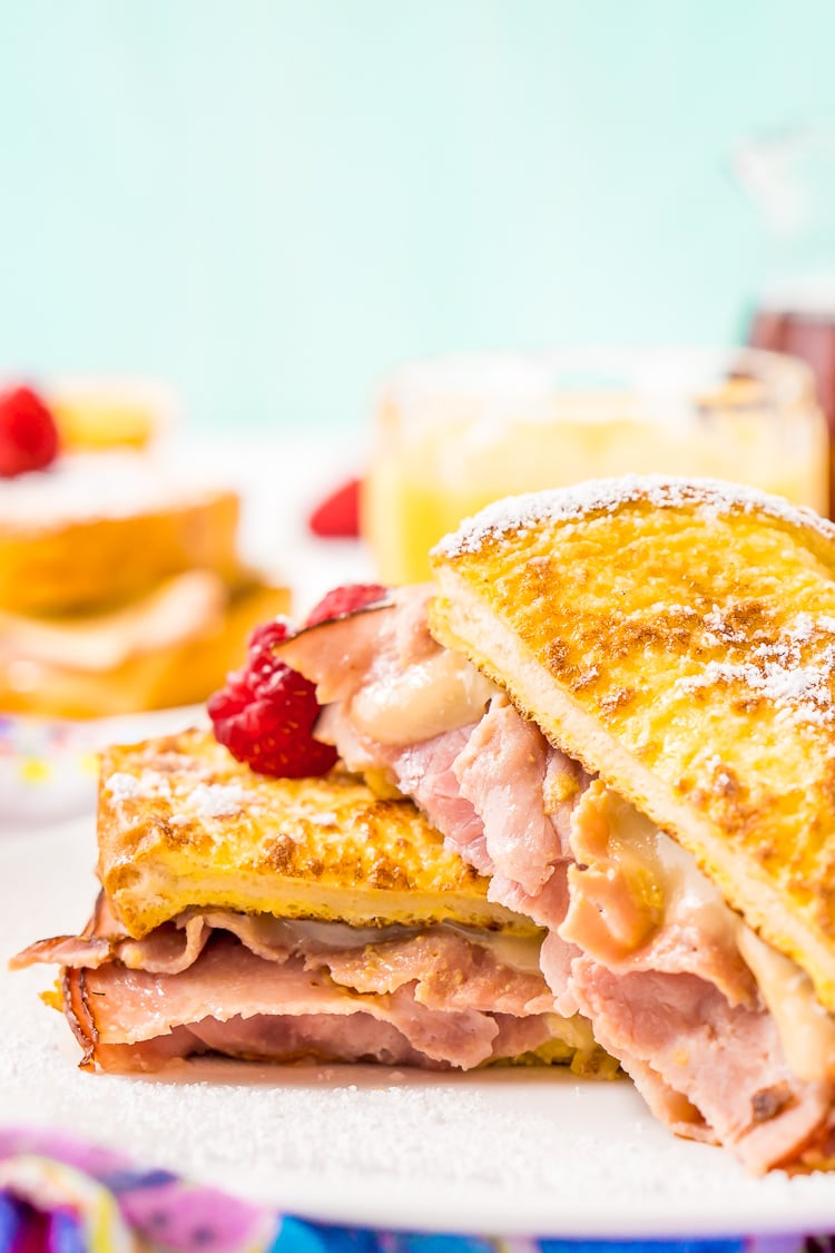 The Monte Cristo Sandwich is a breakfast twist on a classic ham and cheese. Tender slices of deli ham are sandwiched between two pieces of French toast and melty cheese for an addictive dish you'll want to make over and over again!