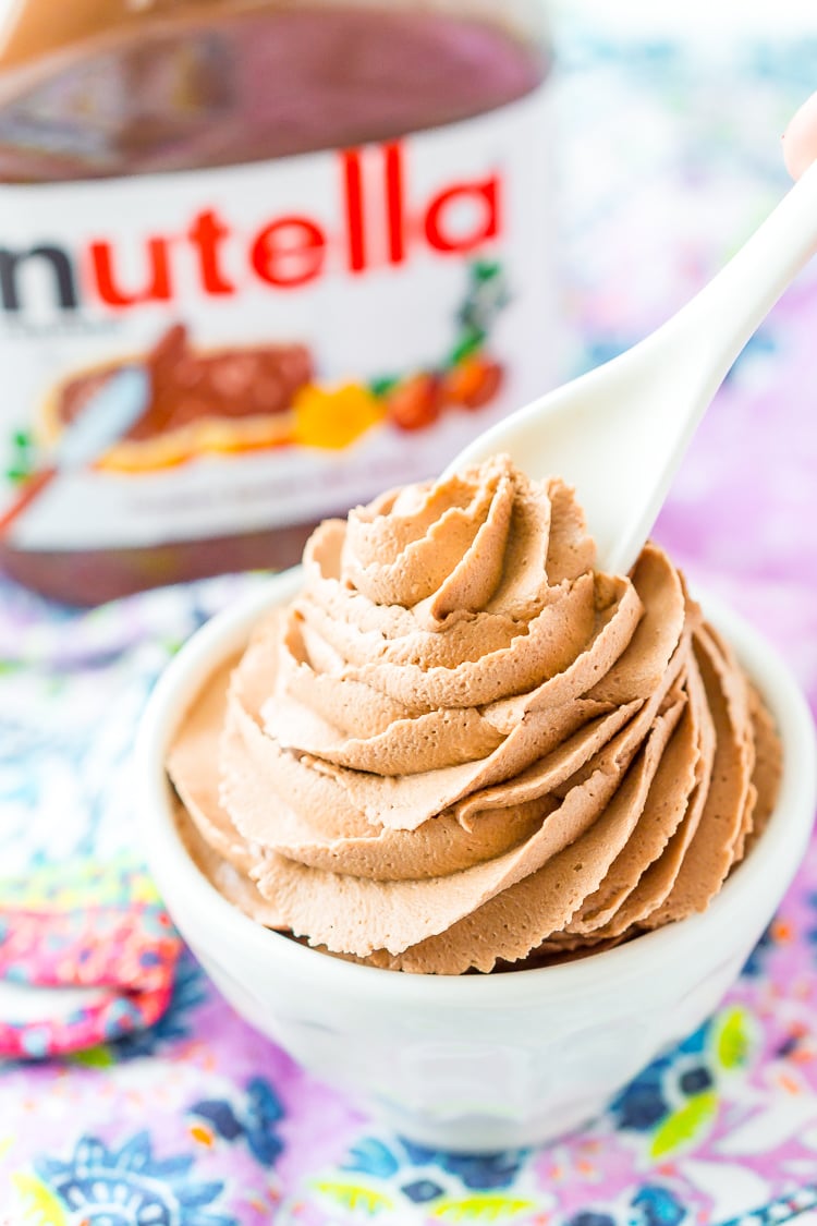 Nutella Frosting adds chocolate and hazelnut flavors to a traditional buttercream recipe. Made with Nutella, butter, powdered sugar, and heavy cream, this whipped Hazelnut Frosting is totally addictive!
