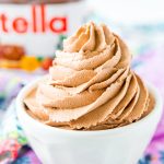 Nutella Frosting adds chocolate and hazelnut flavors to a traditional buttercream recipe. Made with Nutella, butter, powdered sugar, and heavy cream, this whipped Hazelnut Frosting is totally addictive!