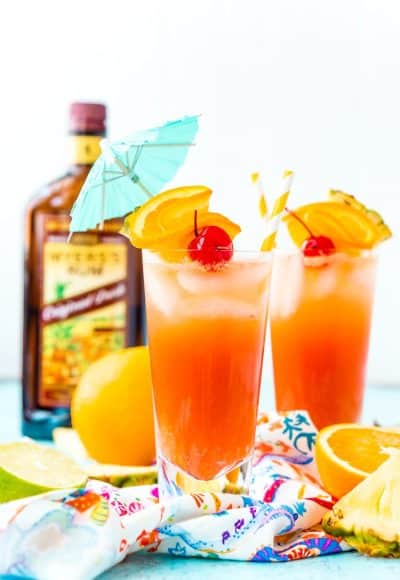 Planter’s Punch is a fruity cocktail that’s spiked with rum. Made with orange and pineapple juices, a splash of lime, grenadine, and dark or spiced rum, this tropical mixed drink is dangerously delicious!