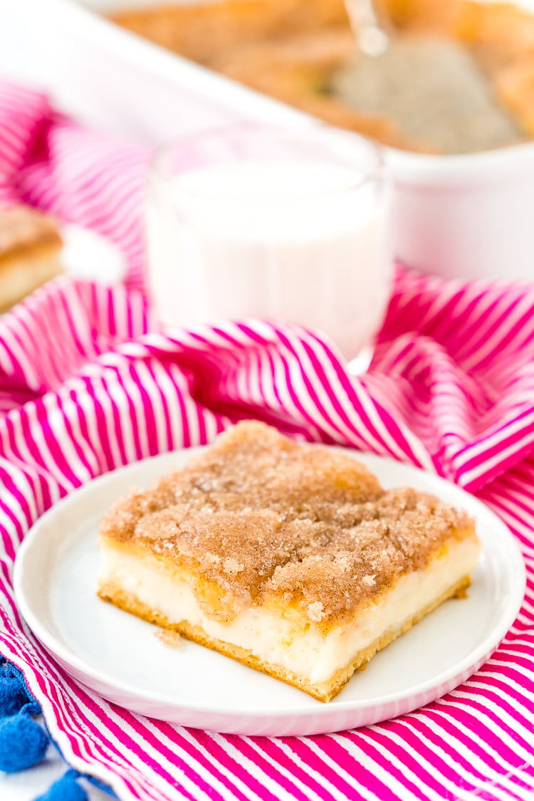 How To Make Sopapilla Cheesecake with crescent roll dough, cream cheese, sugar, butter, cinnamon, vanilla, and honey.