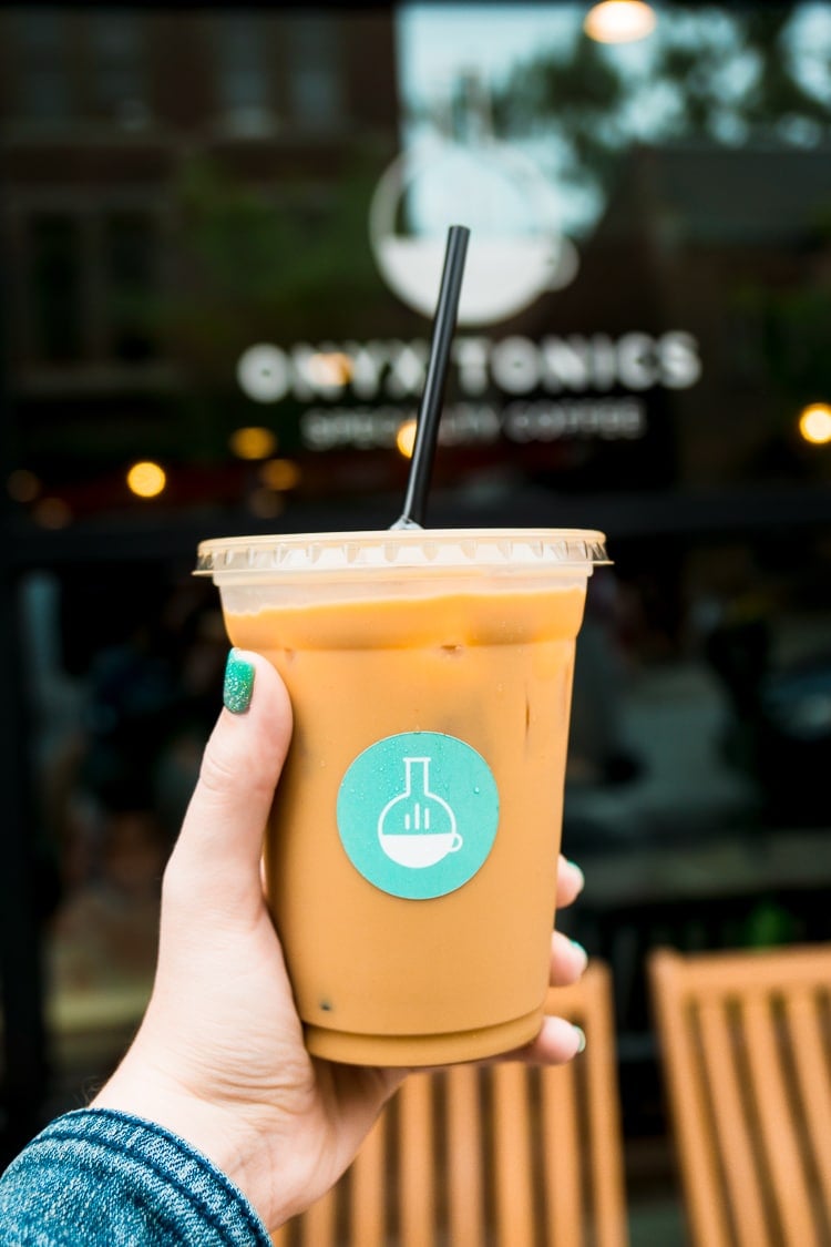 Coffee in a to-go cup from Onyx Tonics