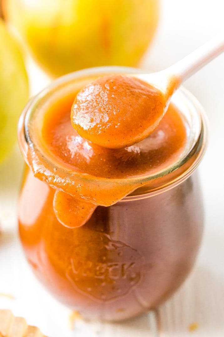 Homemade Crockpot Apple Butter is the perfect way to enjoy the fresh taste of fall apples all season long! Made with apples, sugar, spices, and butter, you can spread it on all your favorite baked goods, mix it into recipes, and more!