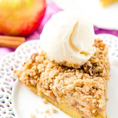 This Impossible French Apple Pie is perfect for people who struggle with pie crust! This spicy and delicious recipe creates its own crust as it bakes!