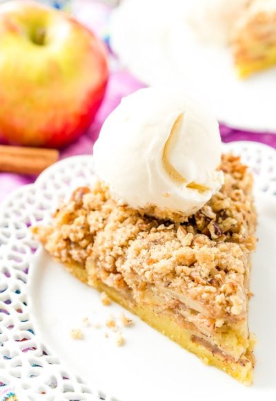 This Impossible French Apple Pie is perfect for people who struggle with pie crust! This spicy and delicious recipe creates its own crust as it bakes!