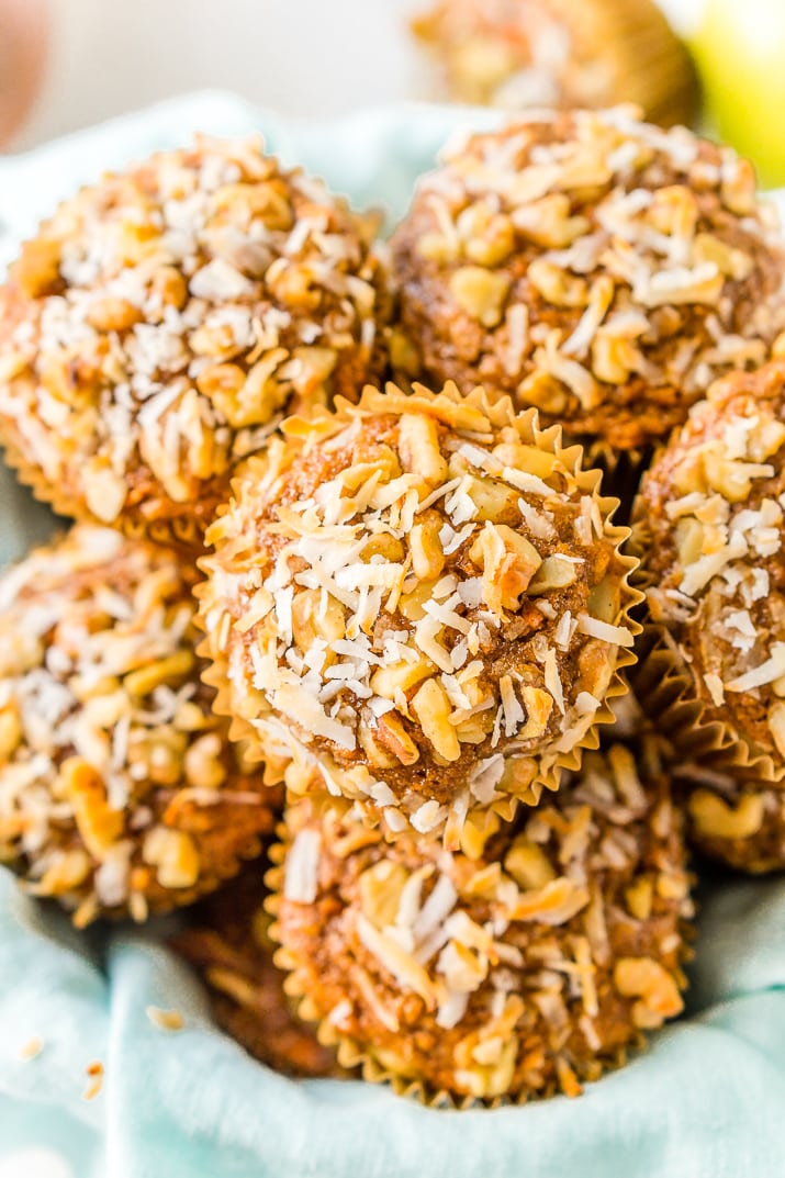 Morning Glory Muffins are a wholesome breakfast or snack recipe made with whole wheat flour and loaded with craisins, carrots, apple butter, walnuts, and more!