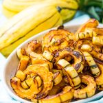 Delicata Squash is a small, easy to cook squash that's sweet and tender and doesn't require peeling because you can eat the skin! Roast it with salt, pepper, and olive oil or cinnamon, brown sugar, and coconut oil for an even sweeter side dish!