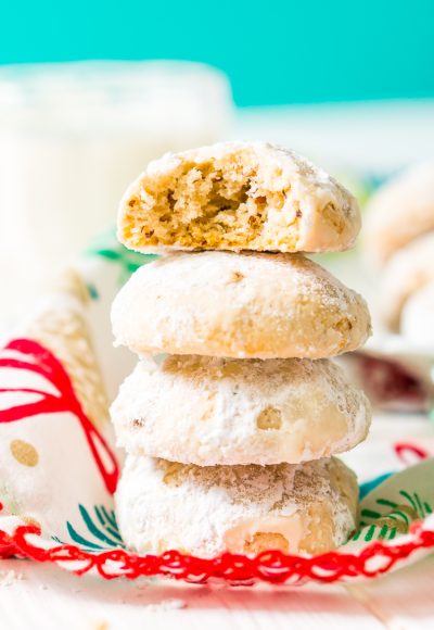 Snowball Cookies are a classic and a staple at holiday cookie exchanges. Made with butter, flour, sugar, vanilla, and chopped pecans, they're a delicious and addictive dessert!