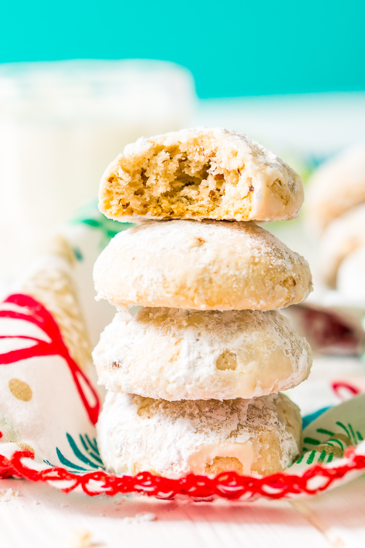 Snowball Cookies are a classic and a staple at holiday cookie exchanges. Made with butter, flour, sugar, vanilla, and chopped pecans, they're a delicious and addictive dessert!