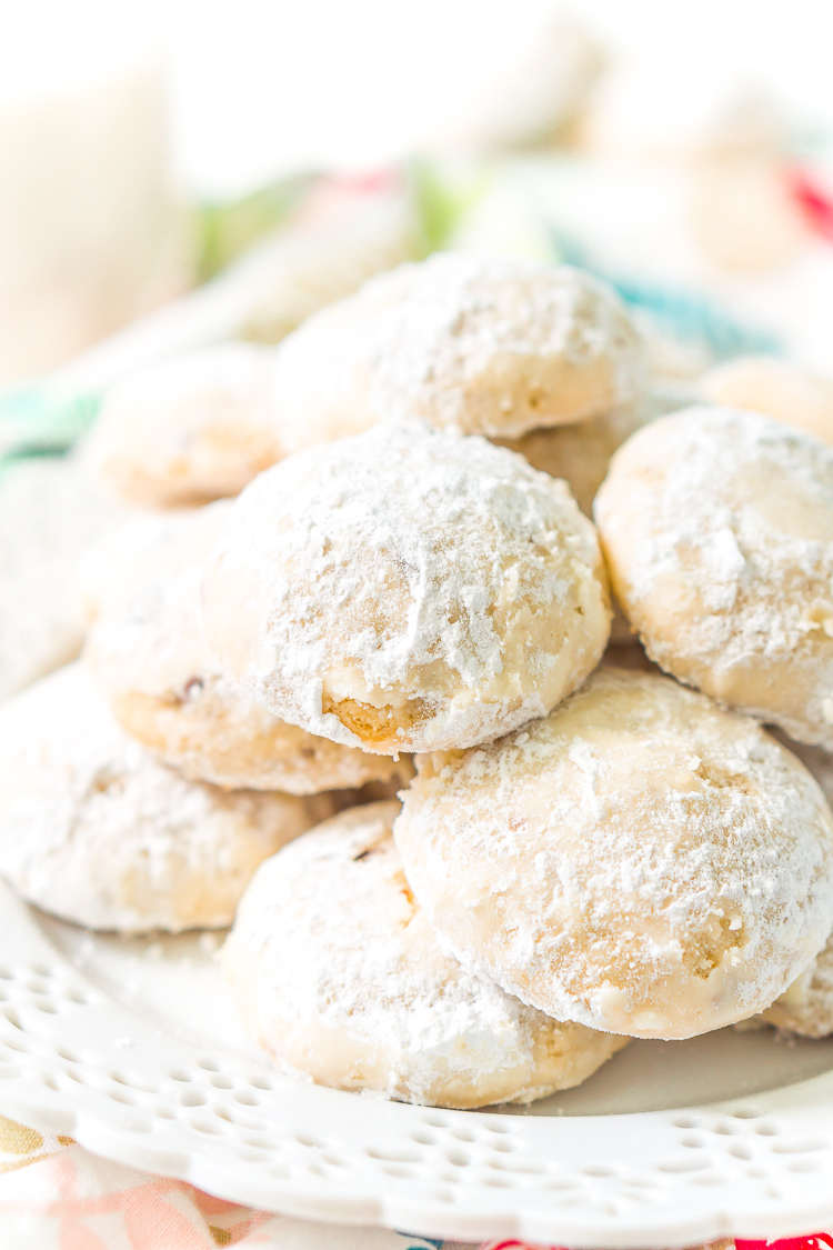 Snowball Cookies are a classic and a staple at holiday cookie exchanges. Made with butter, flour, sugar, vanilla, and chopped pecans, they're a delicious and addictive dessert!