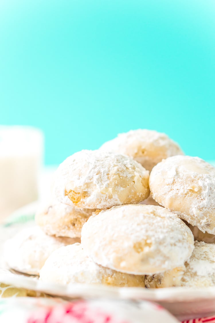 Snowball Cookies are a classic and a staple at holiday cookie exchanges. Made with butter, flour, sugar, vanilla, and chopped pecans, they're a delicious and addictive dessert!