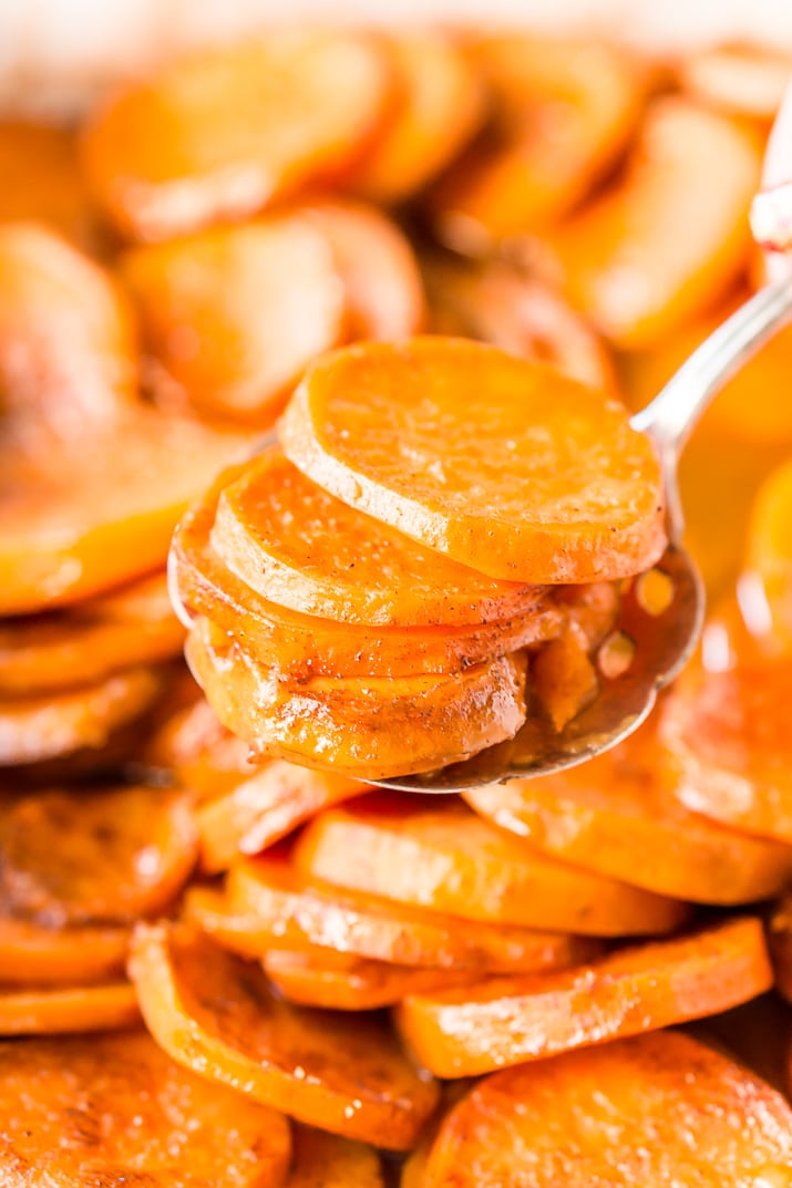 Candied Yams are a classic Thanksgiving side dish made from yams/garnet sweet potatoes and loaded with butter, sugar, honey, and spices.