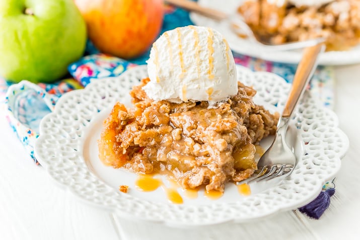 Apple Dump Cake is a 4-ingredient recipe that results in a delicious fall dessert somewhere between apple cake and apple crisp!