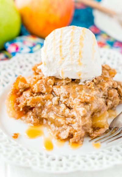 Apple Dump Cake is a 4-ingredient recipe that results in a delicious fall dessert somewhere between apple cake and apple crisp!